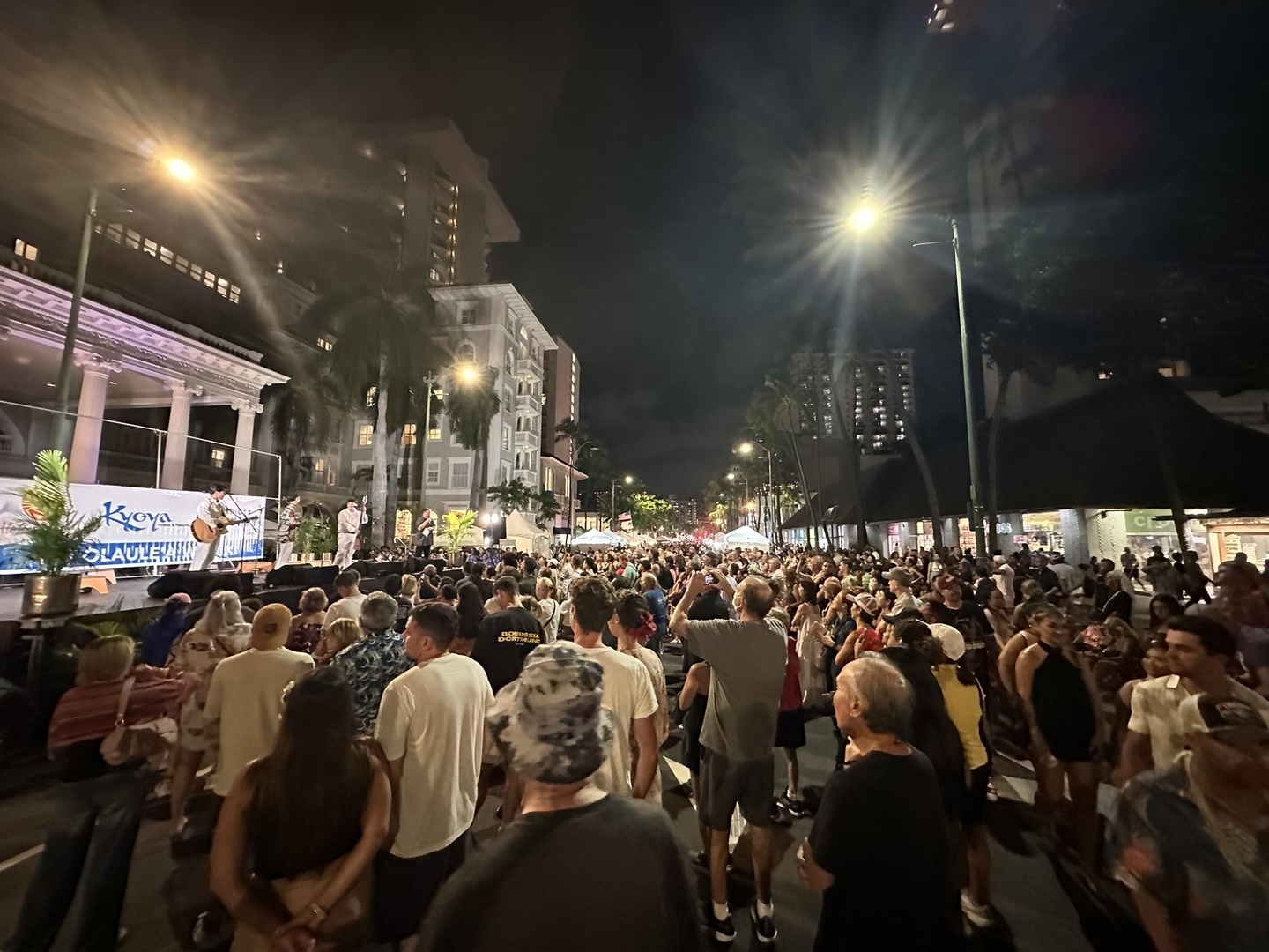 the local Aloha festival with dances and food in the main street of Honolulu